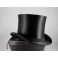 Boîte à chapeau 'Mode de Paris exposition universelle 1889' et un chapeau haut de forme