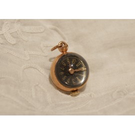 Pendentif petite montre boule à remontoir époque 20ème siècle