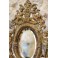 Miroir en bronze à décor d'angelots et mascarons fin 19ème siècle