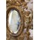 Miroir en bronze à décor d'angelots et mascarons fin 19ème siècle
