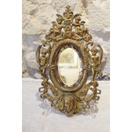 Miroir en bronze à décor d'angelots et mascarons fin 19ème siècle