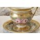 Déjeuner,, tasse et soucoupe, en porcelaine décor de fleurs polychrome, époque Restauration, vers 1830
